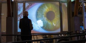 Neil Cadger outside of the RCA viewing the Collective Body projections